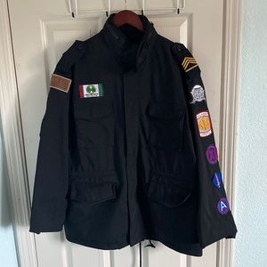 Custom patched military surplus winter coat from NYC boutique